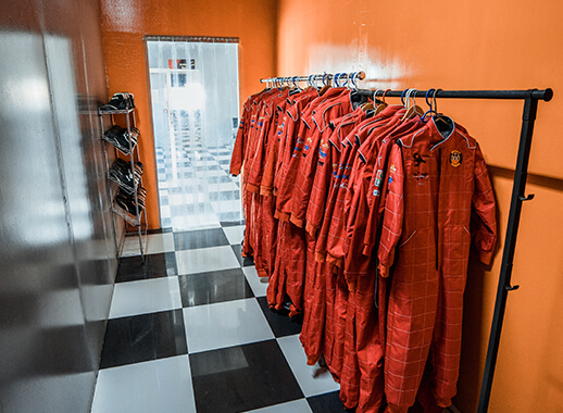 Red jumpsuits used for go kart racing at Monster Experience
