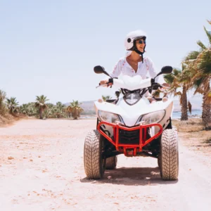 woman-travelling-quad-by-th-ocean-1-min-scaled.